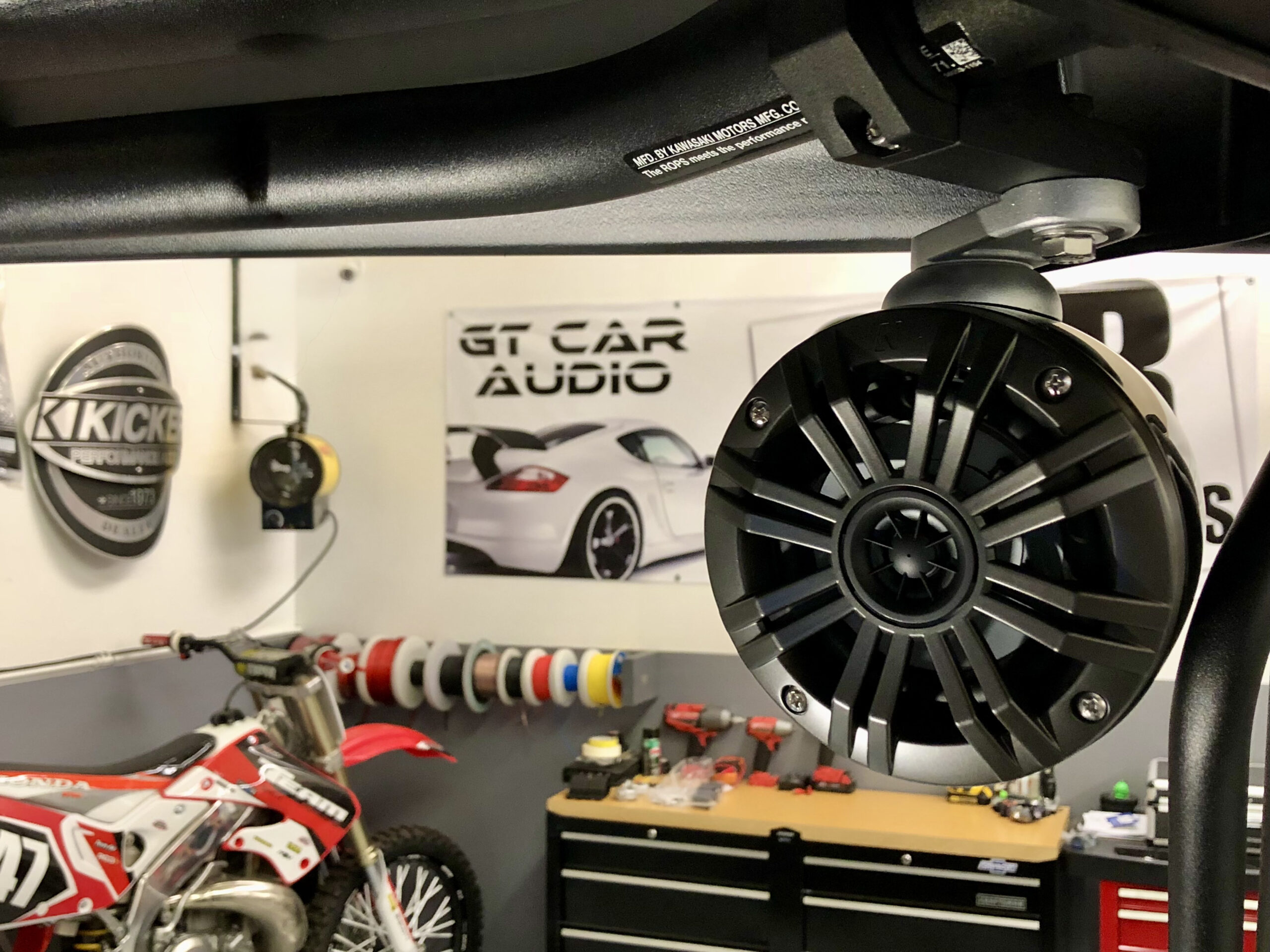 Custom brackets for rear SxS speakers on roll cage