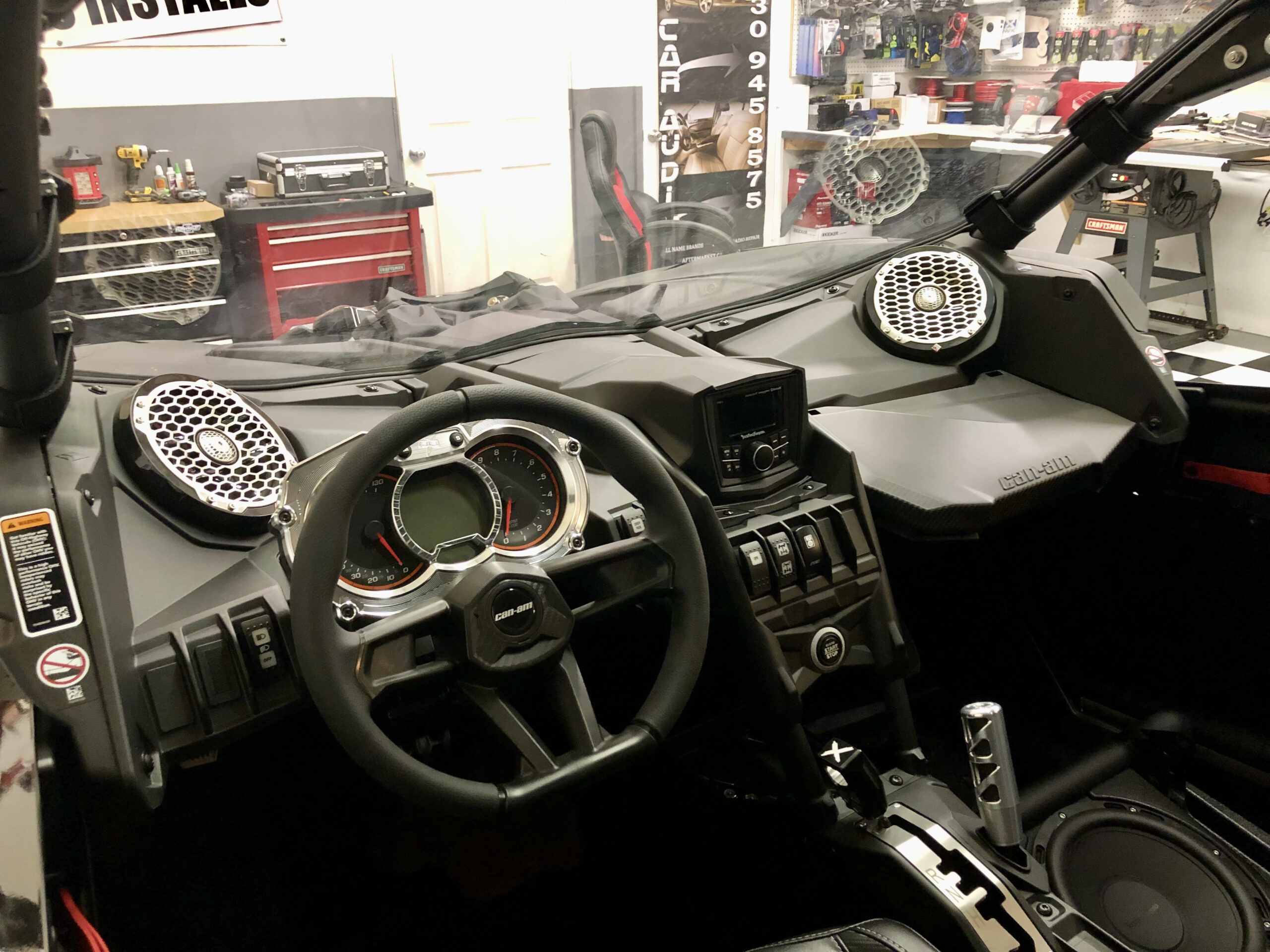 Dashboard-mounted speaker in UTV installed by GT Car Audio
